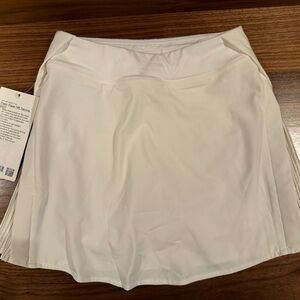 Lululemon size 0 Peek Pleat Tennis Skirt, white. New with tags!!